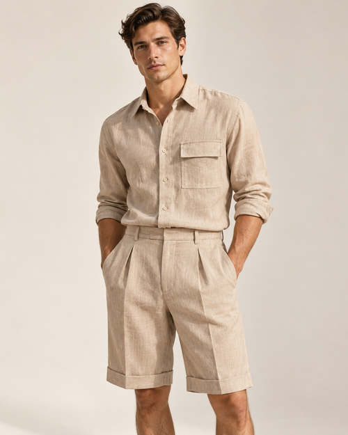 AI-generated styling visualization: male model wearing Luvere Capri Tailored Shorts in Sand with a matching Monaco Linen Shirt, based on original garment photographs.
